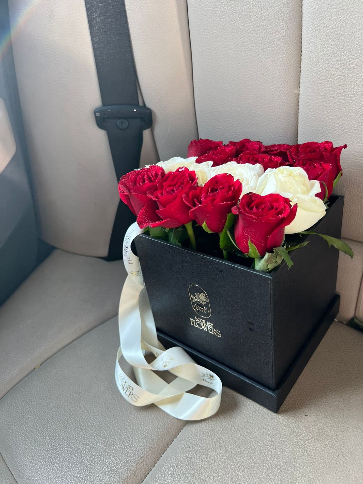 Red and white square box bouqu